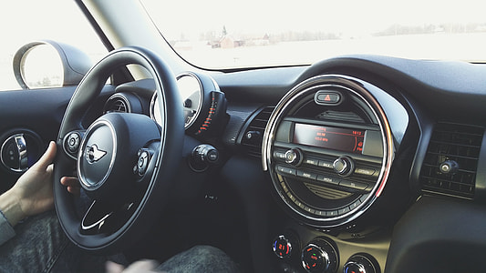 person driving vehicle during daytime thumbnail