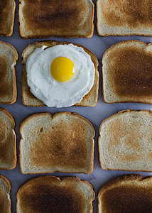 white and yellow egg on toasted bread thumbnail