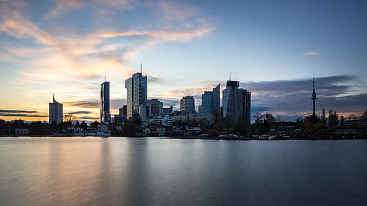 photo of city under cloudy sky during daytime thumbnail