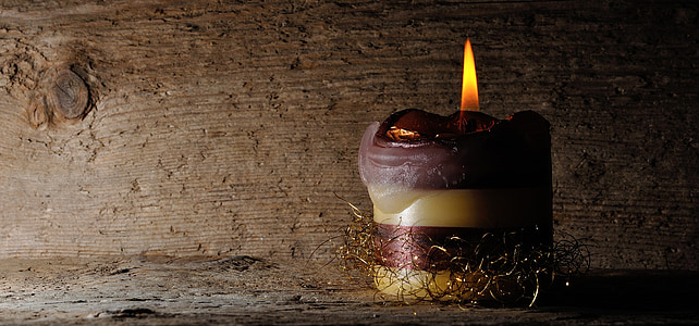 closed-up photography of brown candle thumbnail