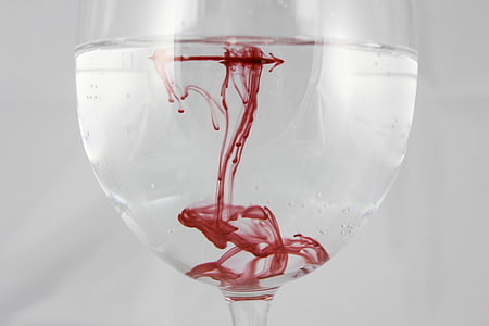 clear wine glass with red liquid thumbnail