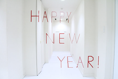 clear glass wall with happy new year text thumbnail