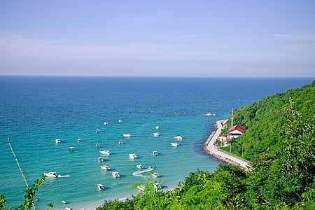 body of water near the mountain thumbnail