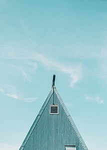 gray house under blue sky thumbnail