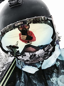 man wearing black Bliz helmet thumbnail