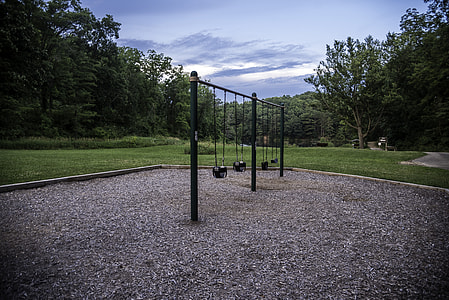 Swingset and landscape under the sky at Stewart Lake County Park thumbnail