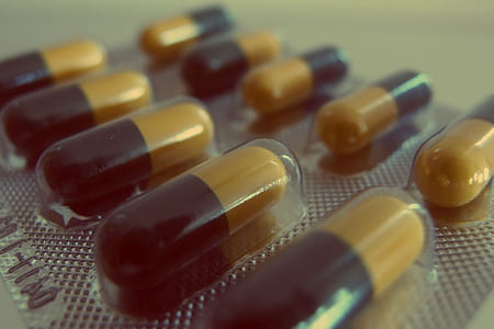 yellow-and-black medication blister pack thumbnail