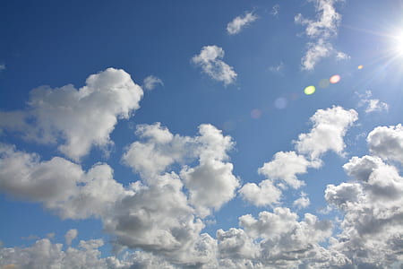 low angle photography of clouds and blue sky at daytime thumbnail