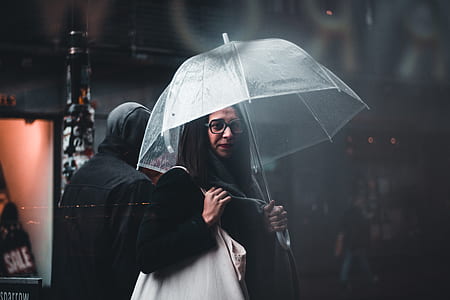 woman holding umbrella thumbnail
