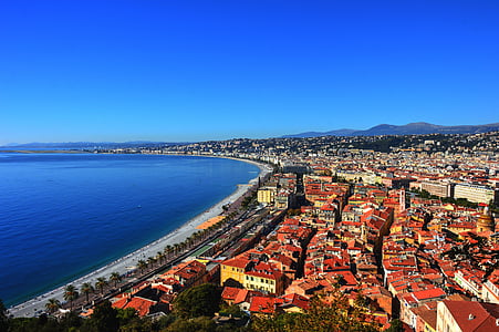 aerial photography of city buildings near body of water during daytime thumbnail
