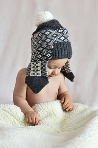 toddler holding blanket thumbnail