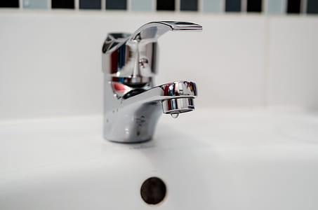 gray faucet on sink thumbnail