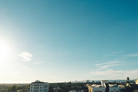aerial view photography of houses under blue sky at daytime thumbnail