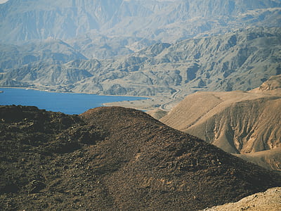 aerial photography of uneven terrain at daytime thumbnail