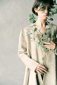 Woman Wearing Long-sleeved Coat thumbnail