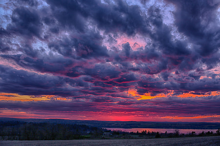 gray clouds photo shot during sun set thumbnail