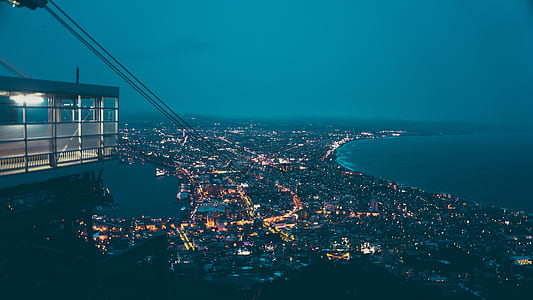 city skyline beside sea aerial photography thumbnail