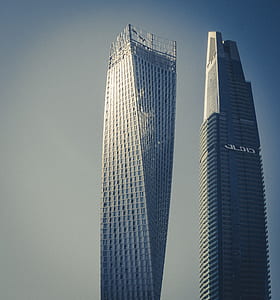 two high-rise buildings during daytime thumbnail