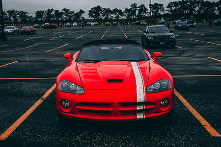 Red Convertible Coupe on Black Surface thumbnail