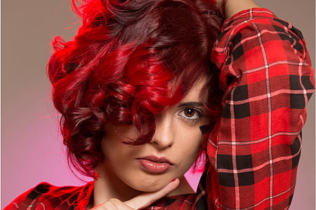 woman in black, white, and red plaid long-sleeved shirt thumbnail