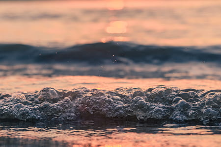 rock surrounded by bodies of water thumbnail