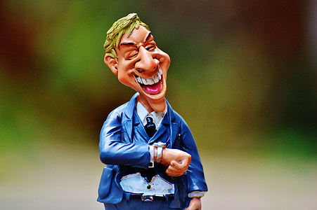 blue dressed man figurine thumbnail