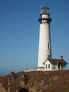 white lighthouse on top of mountain thumbnail