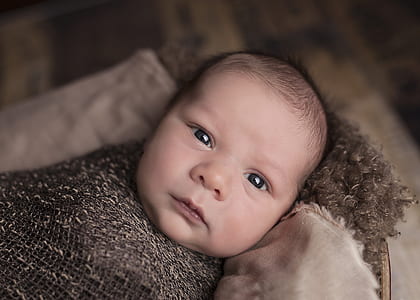 selective focus candid photography of child thumbnail