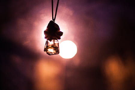 selective focus photo of charm pendant thumbnail