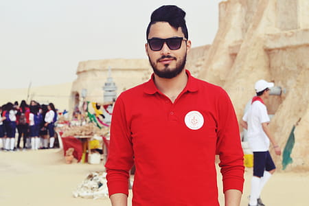 Man Wearing Red Long-sleeved Polo Shirt thumbnail