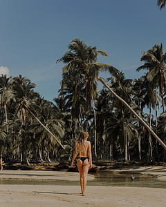 topless woman wearing black pantie walking near riverbank thumbnail