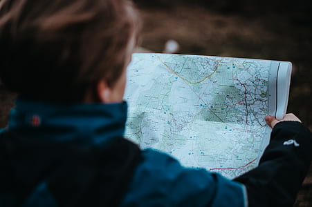 person reading map thumbnail