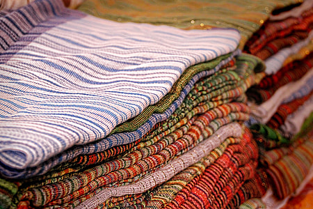 piles assorted-color textiles thumbnail