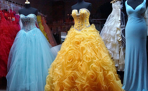 women's assorted-colored gowns on display during daytime thumbnail