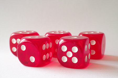 five red and white dices on white surface thumbnail