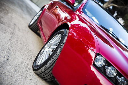 red convertible on road thumbnail