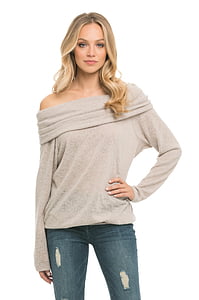 blonde haired woman wearing gray off-shoulder long-sleeved top and distressed blue denim bottoms thumbnail
