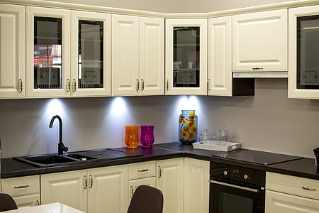 white and black wooden kitchen cabinet thumbnail