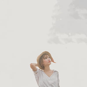 woman wearing sunhat posing thumbnail