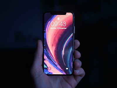 person holding turn-on smartphone thumbnail