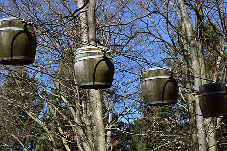 brown basket hanging on wire thumbnail