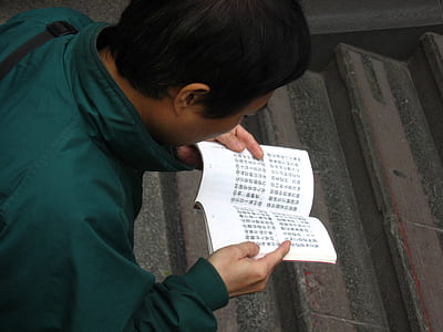 man reading book thumbnail