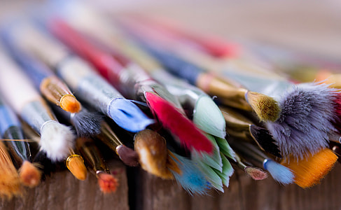 tilt photography of piled paintbrushes thumbnail