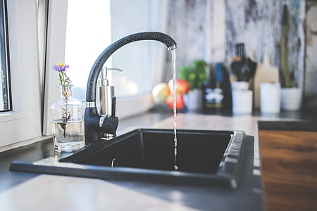 turned on black gooseneck faucet thumbnail
