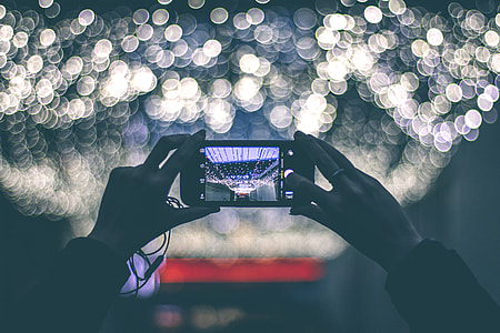 person getting a picture to an event thumbnail