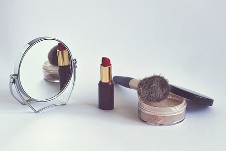 red lipstick and black makeup brush thumbnail