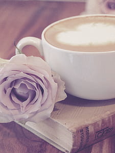 Photography of Flower Beside Coffee on Top of Book thumbnail