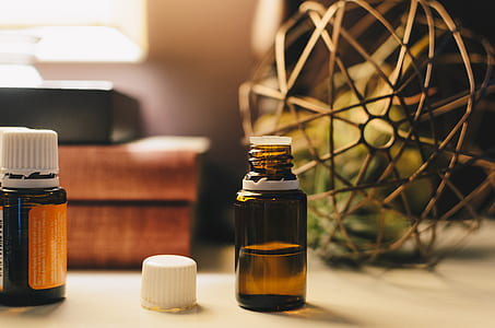 black glass bottle on white surface thumbnail