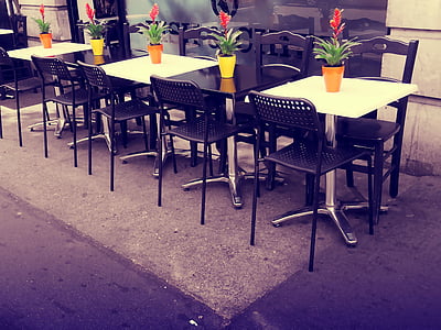 lined up dining tables and chairs thumbnail