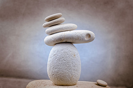 shallow focus photography of balance stones thumbnail
